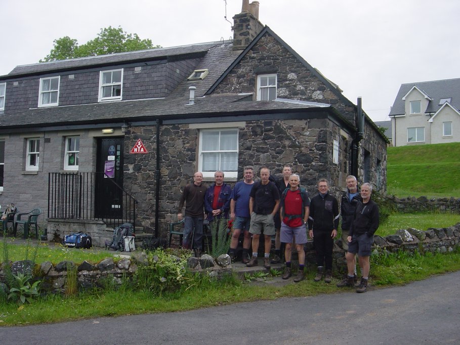 The youth hostel at Kirk Yetholm. L-R, Paul, Richard, Dick, John, Ian, Andy, Graham, Pat, Dave & Steve taking the picture